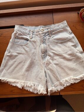 Vintage Light Wash Fringe Hem Denim Shorts